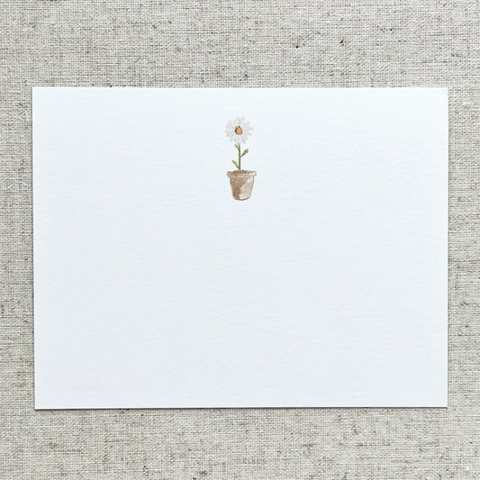 Watercolored potted daisy printed on set of 8 A2 (4.25"x5.5") 120# white eggshell notecard. Made in USA.